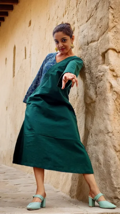 ABASHA - Free Flow Kimono themed Front Up Back Down Flow Dress Ajrakh block Print highlights on right Sleeve and Neck Line .